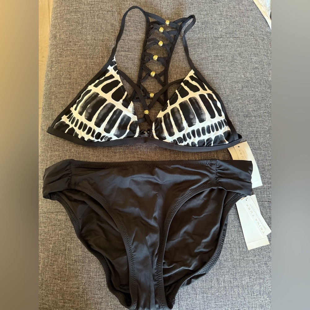 Trina Turk, size 10, Black and white bikini with gold accents.